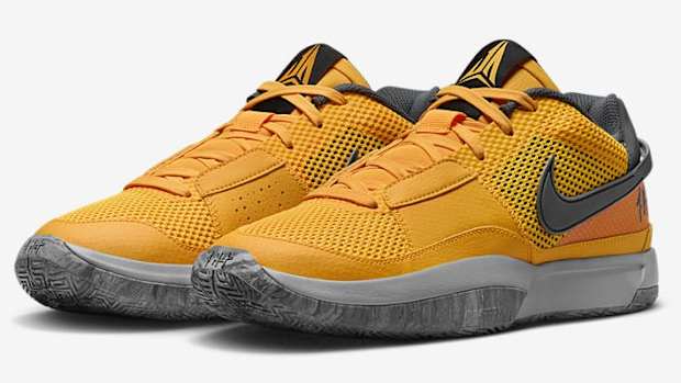 Side view of Ja Morant's yellow, grey, and black Nike shoes.